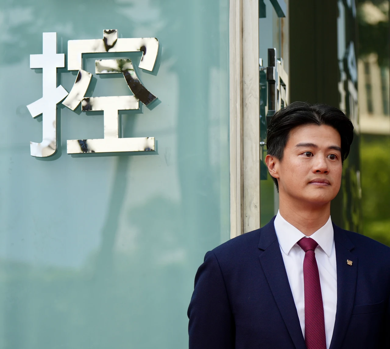吳昕豪參加新新金合併揭招牌儀式。梁建裕攝
