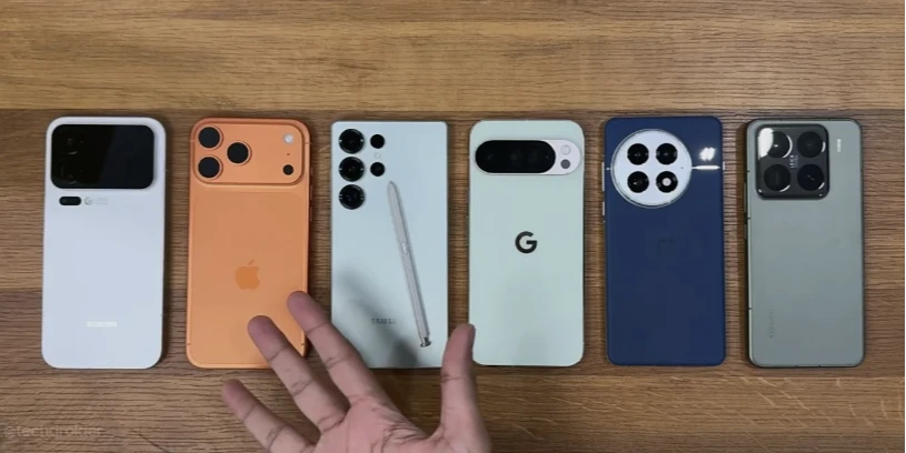左起為小米17 Pro Max、iPhone 17 Pro Max、三星Galaxy S25 Ultra、谷歌Pixel 10 Pro XL、一加13、小米15 Pro。取自YouTube頻道TechDroider