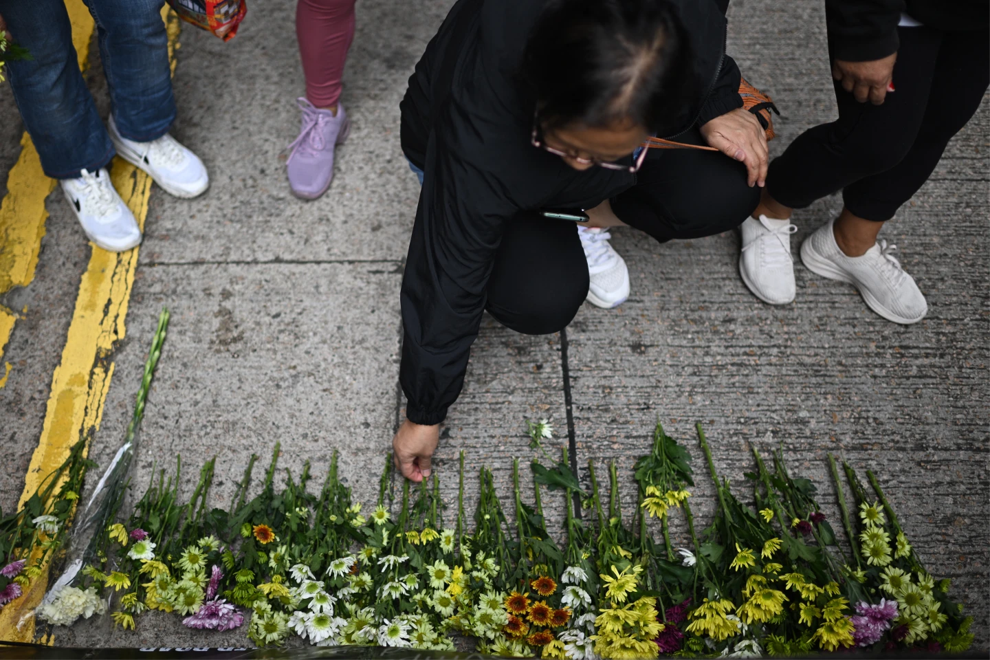 宏福苑大火燒出香港外傭艱難處境　火場救雇主命卻憂工作不保